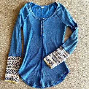 Free People blue long sleeve waffle shirt with sweater wrist detail. Size small